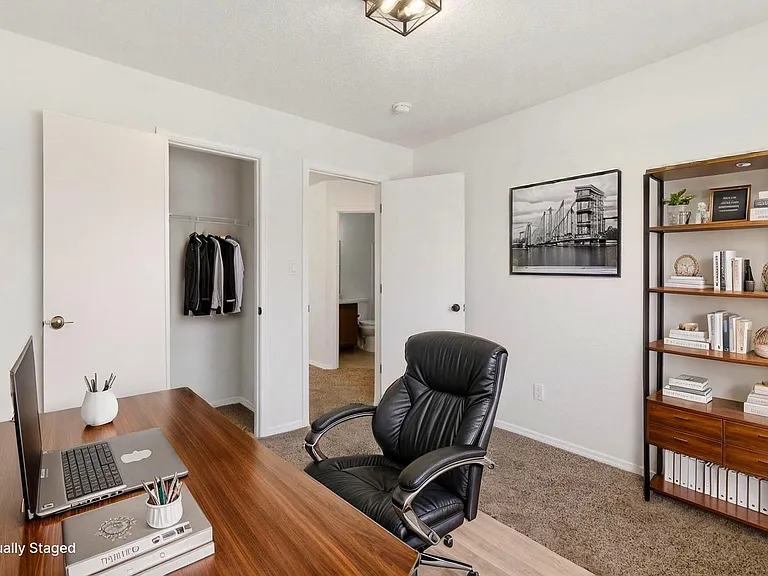 Virtually staged third bedroom/office. Furnishings not included.