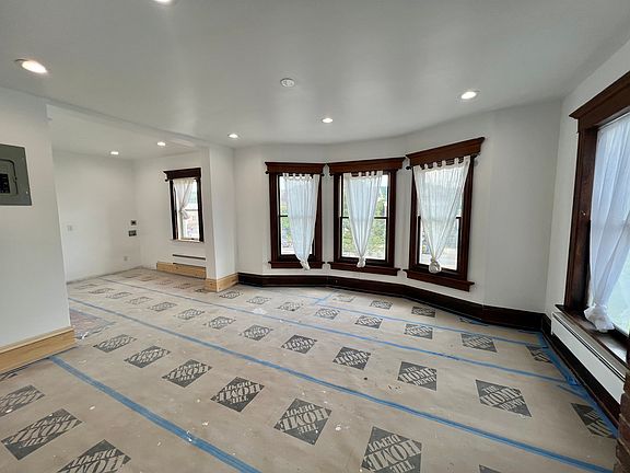 View into living room and eat in kitchen