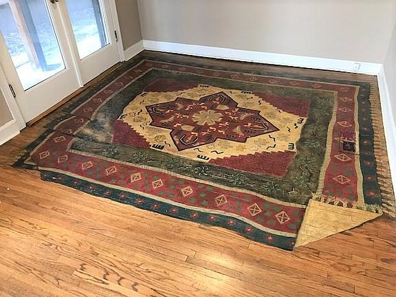 Hand painted rug on the floor