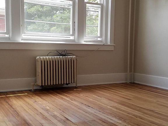 1 bedroom with large closet, hardwood floors, and plenty of natural light