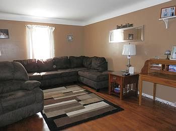 Shining wood floor in this grand living room