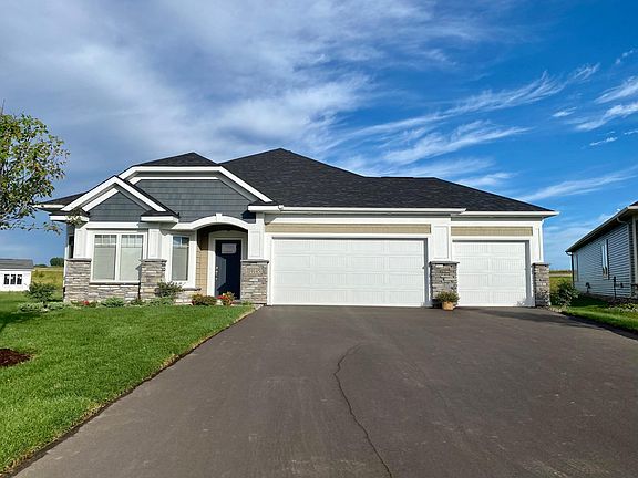 all living facilities on the same level. New home with an open concept floor plan and 3 car garage!