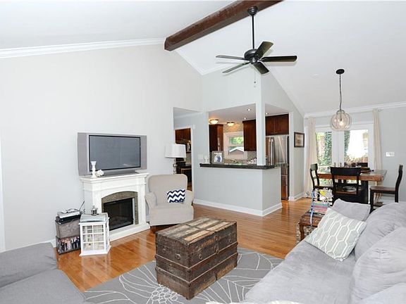 Open living room, kitchen, dining nook (with furniture)