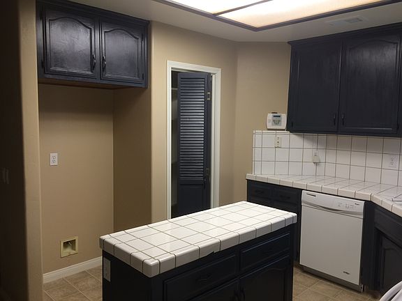 Kitchen view from back door to garage