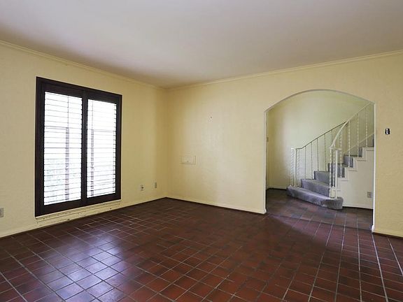 Living room looking into entry hall.