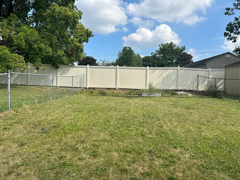 Children and pets can enjoy the large, fenced backyard. And there's room for a garden!