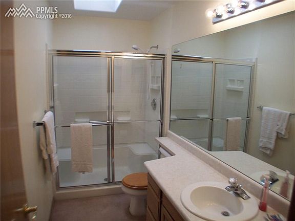 3/4 Guest bath features massive counter space with violin top, glass enclosed sh
