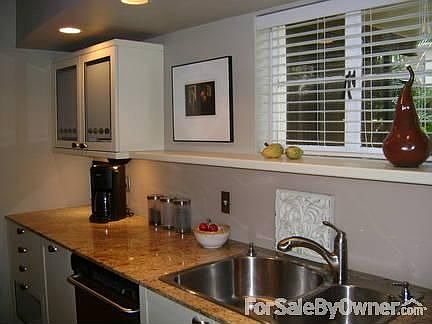 Kitchen : Italian Lube cabinets, gas cook top, granite counter tops & stainless appliances