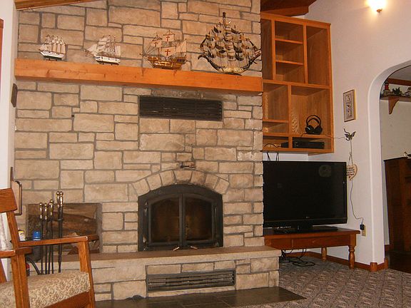 4.82 +/- acres Verndale Main floor family room with wood burning fireplace