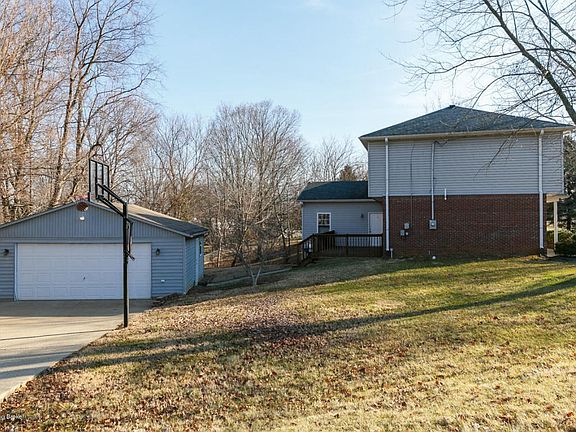 View from corner of yard to side of home