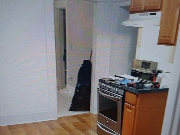 kitchen has range, refrigerator, dishwasher and pantry