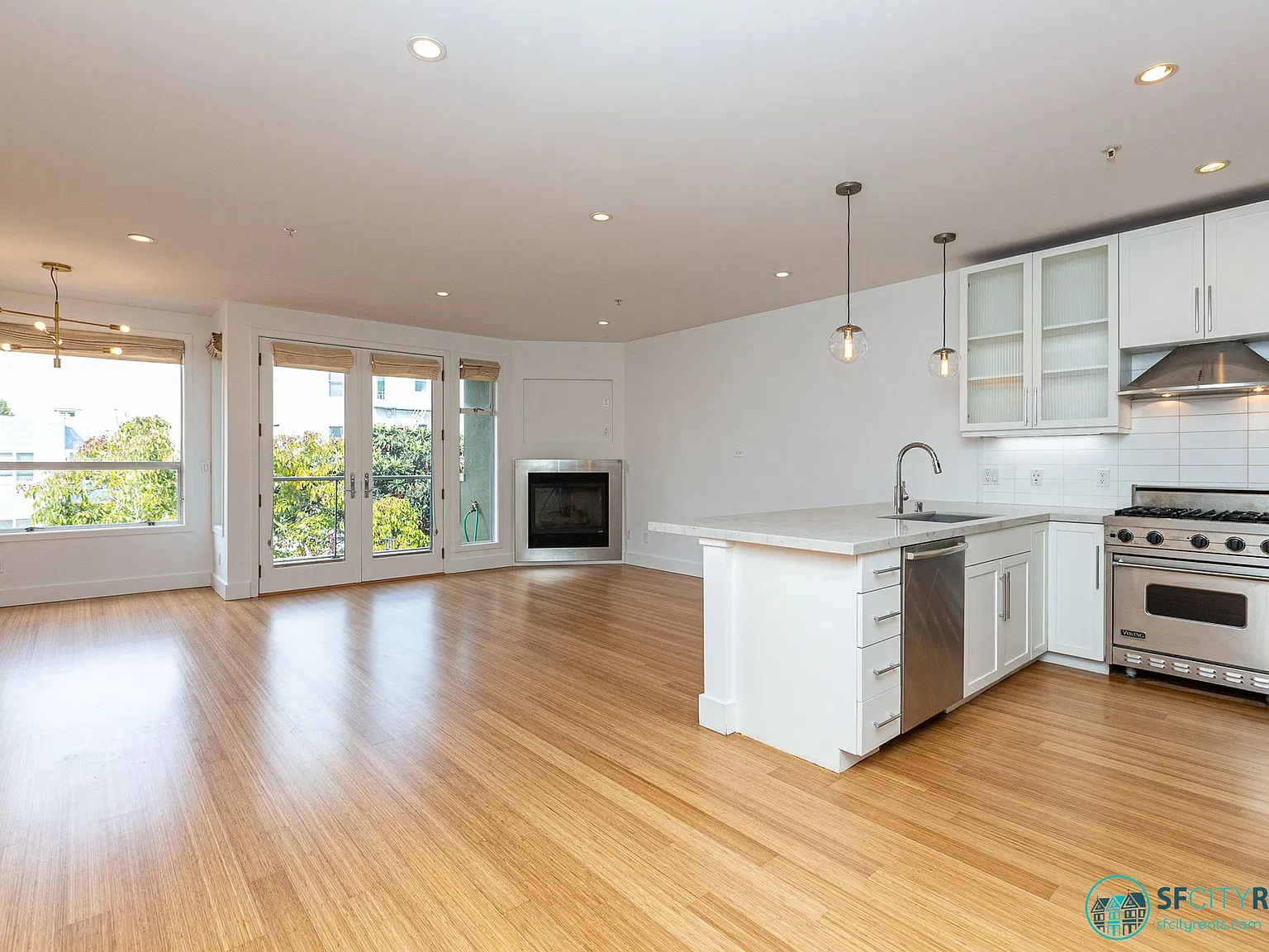 Marina: Stunning Top Floor Bi-Level Condo w/ 2 Car Parking + 2 Patios — Photo 1