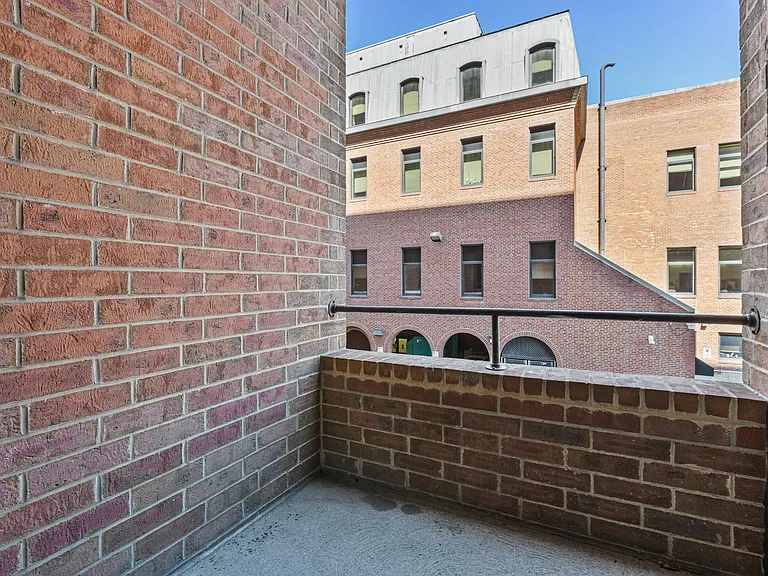 Outdoor balconies on both the first and second floors