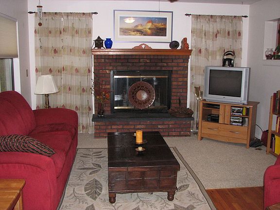 Wood burning, recirculating fireplace.