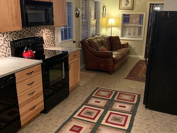 Kitchen with view of the living area