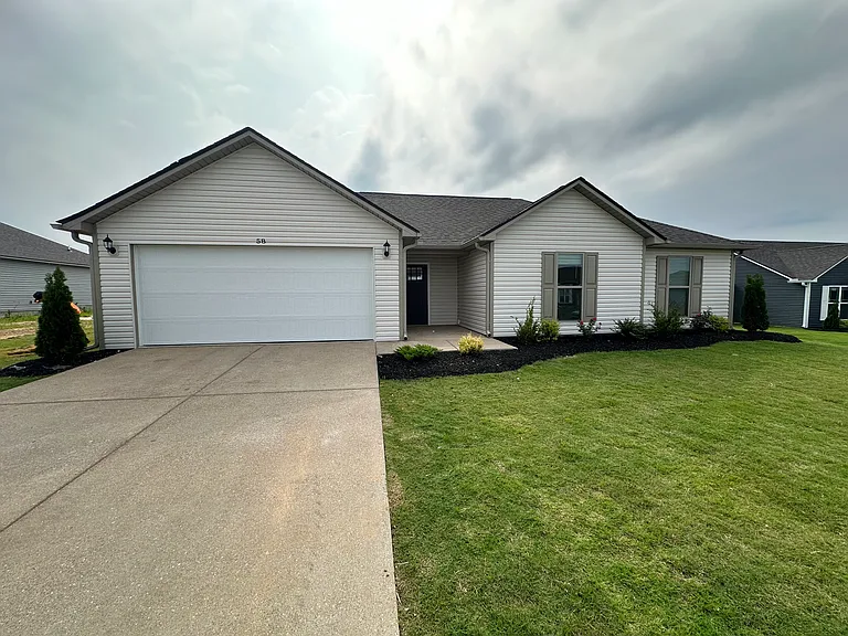 58 Frostwood Cv — Photo 1