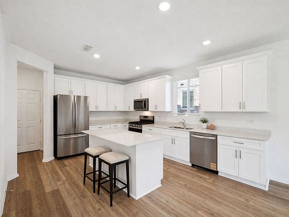Spacious kitchen with eat-in island
