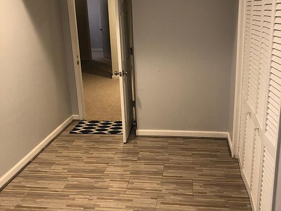 Entrance Hallway with Shared Laundry to the Right