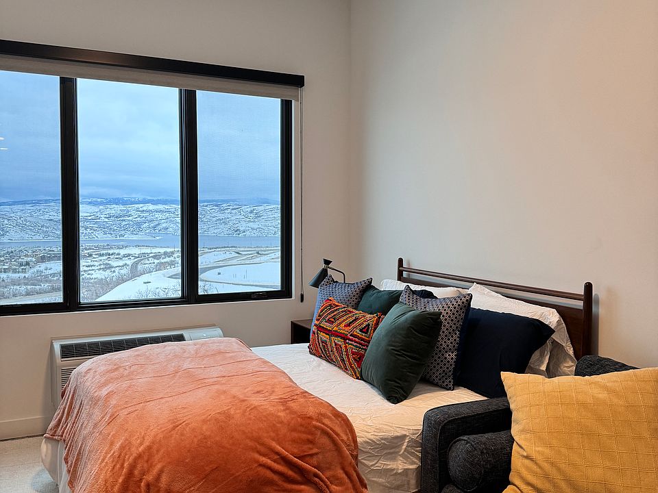 Queen bed, couch, dresser, coffee table and TV included.