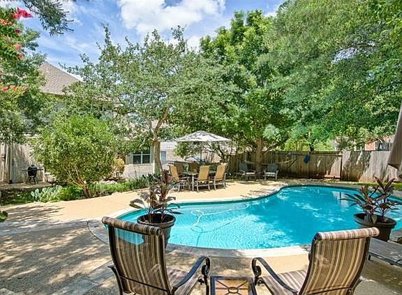 OVERSIZED LOT WITH PLENTY OF YARD AND POOL!