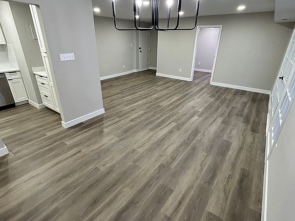 Dining/Living room with recess lights.