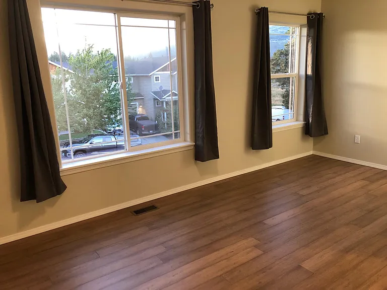 Den with west facing windows with great territorial views and sunsets.