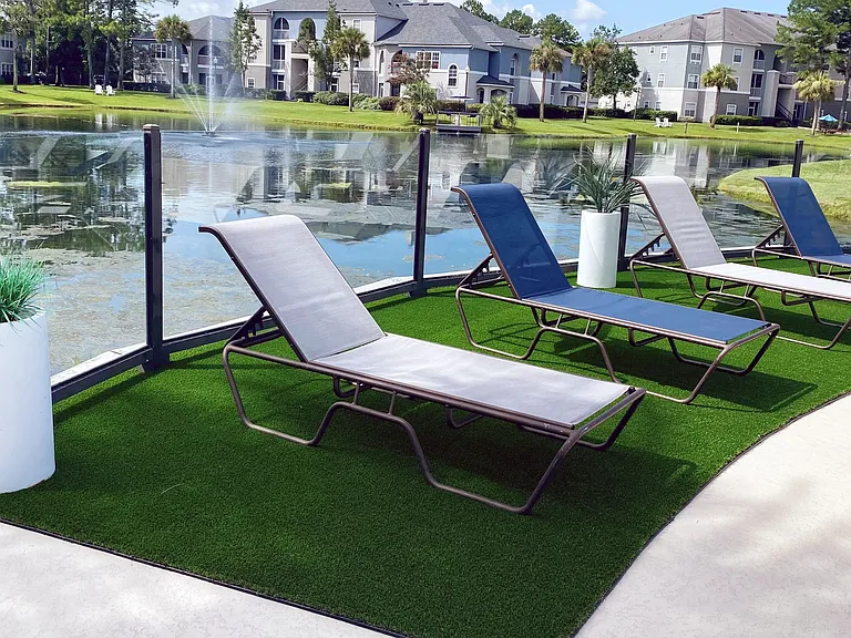 Relax in style at our lakeside lounging area. Featuring comfortable lounge chairs and stunning water views, it's the perfect spot to unwind and soak up the serene ambiance of our community.