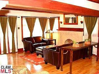 The Living Room as well as most areas have Hardwood Floors