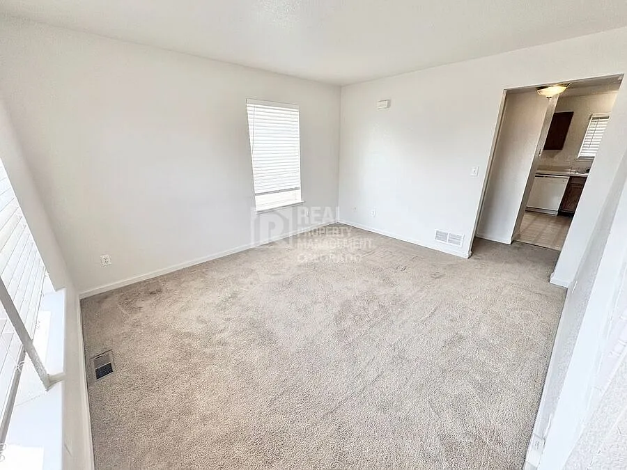 Charming 2BR Townhome with Fenced Yard & In-Unit Laundry Near High Line Canal Trail — Photo 2