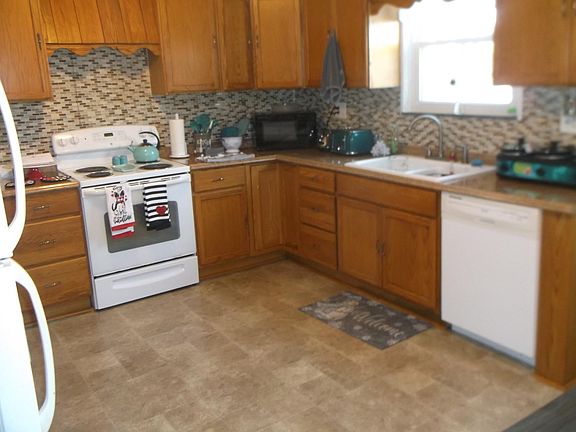 Kitchen-Stove, Refrigerator, Dishwasher and Garbage Disposal.