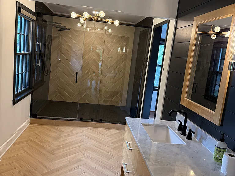 Primary bath with walk-in shower and walk in closet.