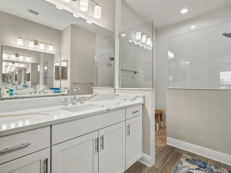 Oversized ceramic walk-in shower. Ceramic to the ceiling.