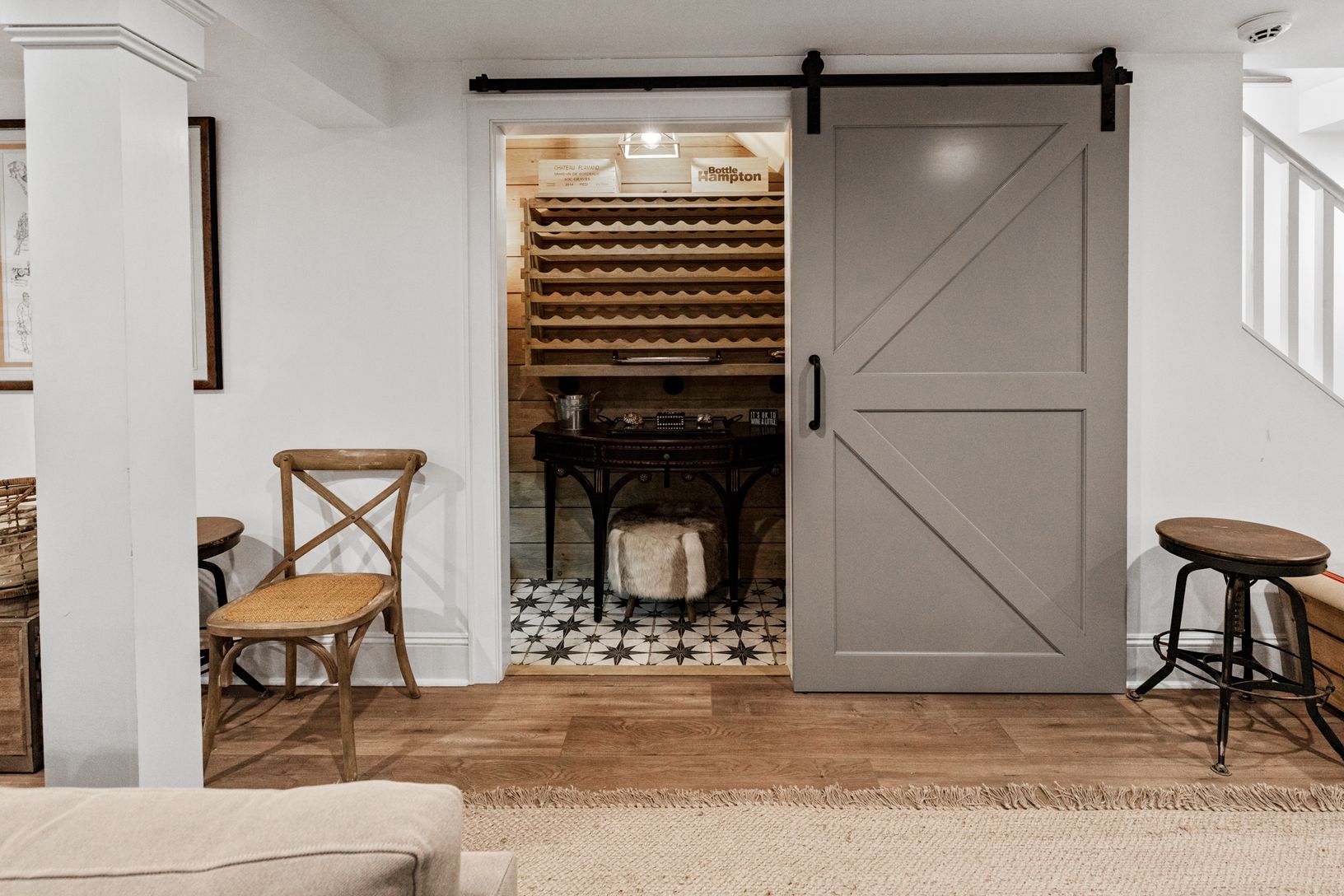  Wine room with built in kitchen-aide dual zone wine refrigerator 