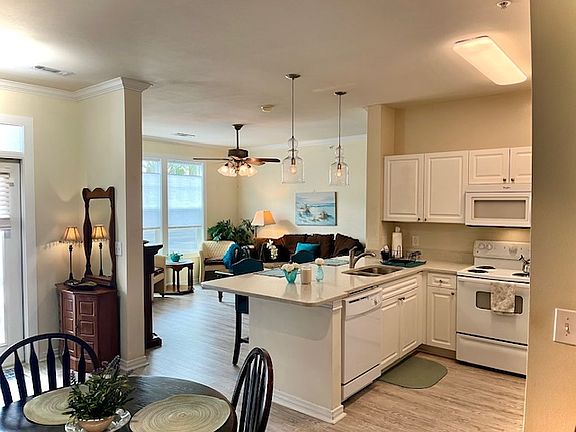 New Flooring and Quartz Countertops! Remodeled to provide modern, sunny and bright, open-area design!