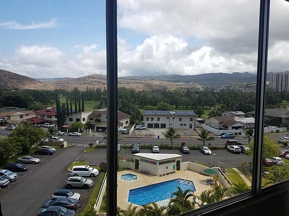 View( Golf Course, Parking Lot, Swimming Pool, etc.) through the Livingroom windows and Screens