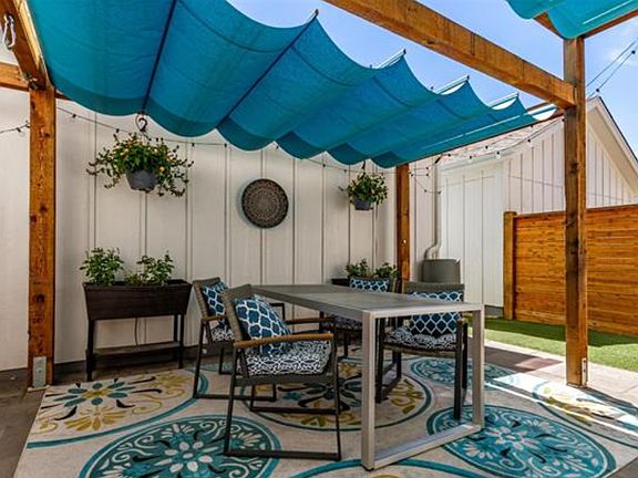 Adjustable Pergola shades and lighting make this the perfect oasis for all times of the day.