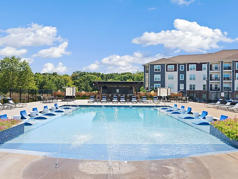Our pool features a fountain and in-water sundeck to cool off during the summer months.