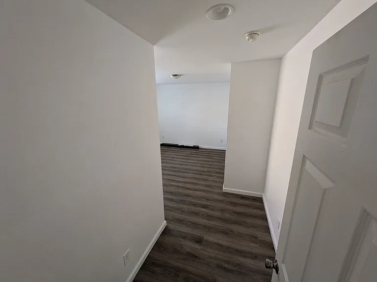 Shot of the room standing at the entrance of the room itself.