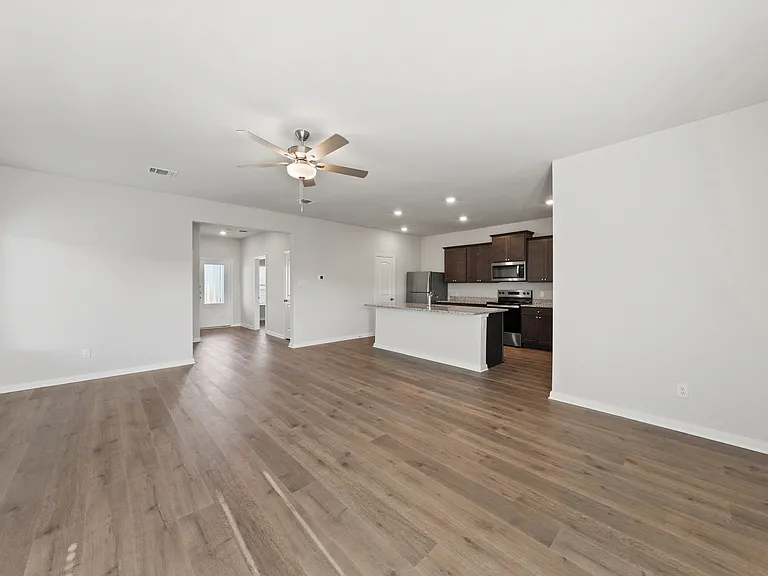 The family room is a spacious and flows perfectly for everyday living and hosting.