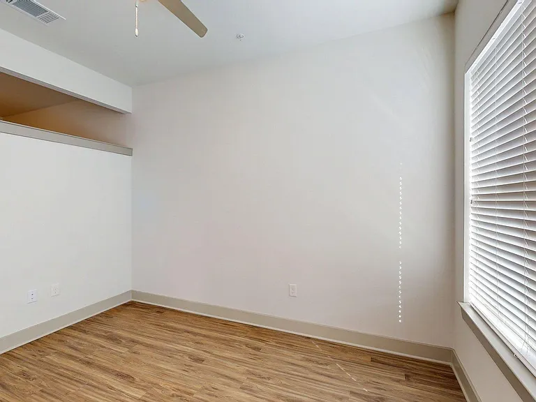 Apartment Living Room with Wood Style Flooring.