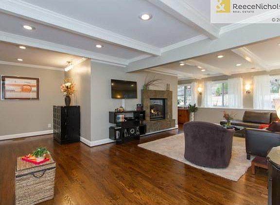 Perfectly updated with beautiful hardwoods throughout main level