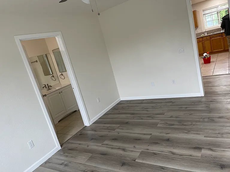 master bedroom with walk in bathroom