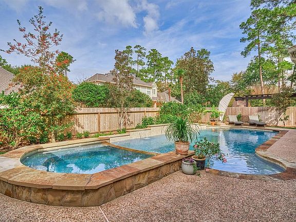 The fabulous pool and spa in the backyard! Relax poolside during the the hot summer months or in your large hot tub on the cooler evenings!