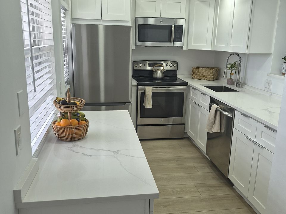 1st image of 3050 N Palm Aire Dr APT 702