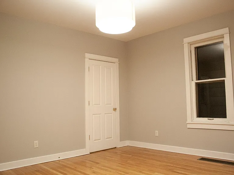 Dining / bonus room, basement door