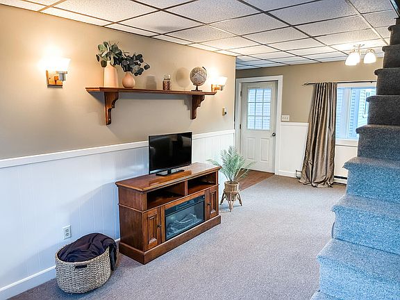 Living room, view of back door and stairs to office and bedroom-1st floor