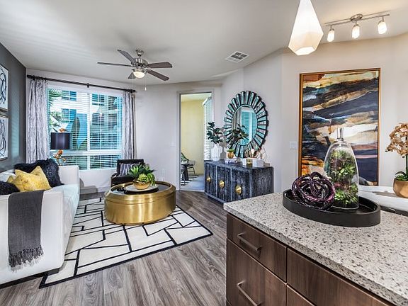 Our spacious living rooms have a separate dining area and wa