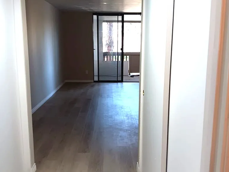 From master bath into master bedroom and out to balcony.