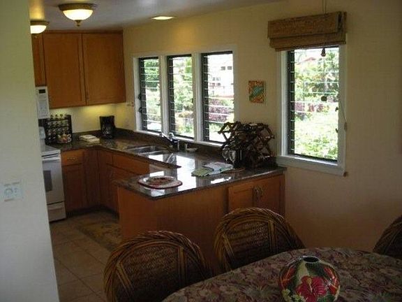 Poipu Sands #621 Kitchen with mountain and ocean views