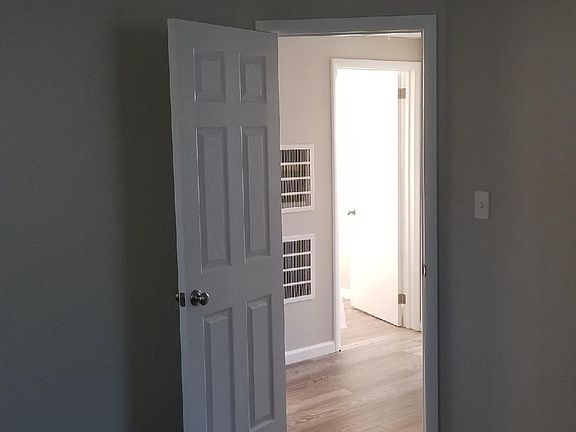 Bedroom looking into hallway